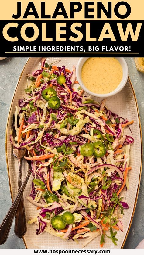 Cool, creamy, and crunchy, with a kick - this Jalapeño Coleslaw is far from boring or bland! Featuring crisp cabbage, spicy jalapenos, sweet carrots, and a creamy, tangy dressing, this is the flavorful and refreshing slaw side dish your summer cookouts have been missing. Spicy Asian Slaw, Jalapeño Cole Slaw, Jalapeno Slaw Recipes, Spicy Slaw For Pulled Pork, Pickled Slaw Recipes, Unique Slaw Recipes, Jalapeno Coleslaw Recipes, Pioneer Woman Coleslaw, Texas Bbq Sides