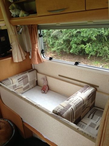 Rv Toddler Bed Ideas, Rv Crib Ideas, Kids Beds In Camper, Crib In Rv, Rv Living With Baby, Caravan Bedding, Campervan Baby Bed, Toddler Camping Bed, Caravan Bed