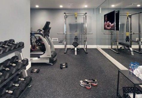 Your home gym should be a welcoming space you look forward to entering; after all, it’s yours alone. No sharing with strangers or fighting over equipment, no restrictions or hefty membership fees; your personal gym should be designed to suit the man you are, and no doubt the man you are shaping up to be. #basementflooring Home Gym Layout, Basement Gym Ideas, Home Gym Basement, Contemporary Basement, Home Gym Flooring, Basement Gym, Gym Room At Home, Home Gym Decor, Best Home Gym