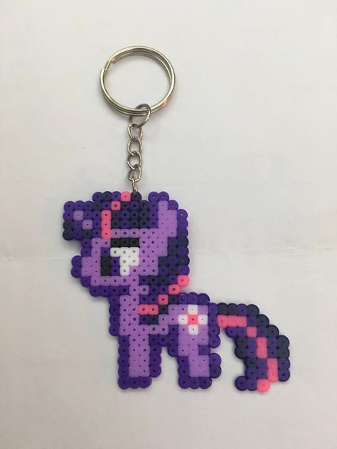 Purple Perler Beads, Purple Perler Bead Patterns, Mlp Pixel Art, Purple Pixel Art, Keychains Ideas, Mini Hama Beads, Hama Beads 3d, Pony Bead Crafts, Pixel Beads