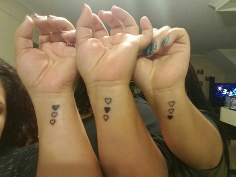 Classy and simple- 3 sister tattoo Sister Tattoos For 3 Small Simple, Tattoo Ideas Female Sisters 3, Unique Sister Tattoos For Three, Tattoo Ideas For Three Sisters, Three Heart Sister Tattoo, Sister Symbol Tattoos, 3 Sister Tattoos, Three Sister Tattoos, Siblings Tattoo For 3