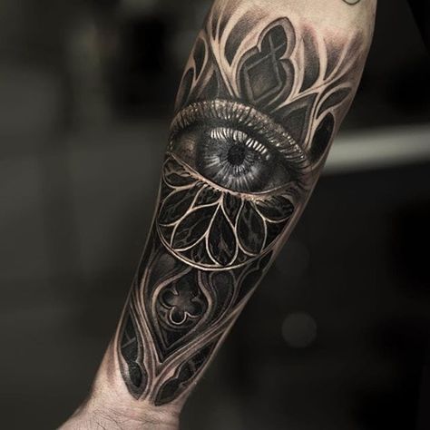 Tattoo uploaded by Ross Howerton • A realistic eye meshed into a cathedral's rose window via Mumia (IG—mumia916). #architectural #blackandgrey #cathedral #eyeball #Mumia #realism #surrealism • 281360 • Tattoodo Seeing Eye Tattoo, Cathedral Tattoo, All Seeing Eye Tattoo, Surreal Tattoo, Muster Tattoos, Pieces Tattoo, Greek Tattoos, Gothic Tattoo, Arm Sleeve Tattoos