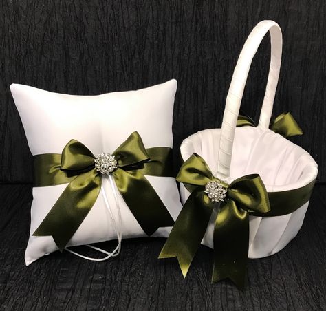 "Olive Green Wedding Ring Bearer Pillow and/or Flower Girl Basket * white or ivory satin choice * olive green accent ribbon with Rhinestone Crystals. See video of how it sparkles! * new ring pillow * 8x8 inches * 1.5\" wide ribbon strap in olive green sewn into the back to help balance. * fake bands included * new flower girl basket * 6\" round, 4\" bowl depth, 10\" high * ribbon wrapped handle * padded underneath to avoid see through of actual basket Common set and individual item quantities ar Green Wedding Rings, Ivory Ring, Olive Green Weddings, Wedding Ring Bearer Pillow, Crystal Buttons, Flower Girl Baskets, Ring Bearer Pillows, Ring Bearer Pillow, Ring Pillow