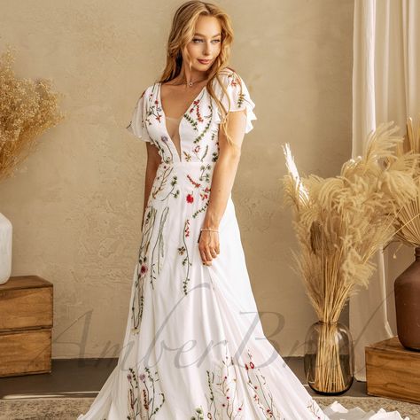 Floral Wedding Gowns 🌸 Which of these floral gowns is your favorite ? 🌸💐☘️ #hightfashionbride #bridetobe #uniquebride #colorfulweddingdress #luxurybridal #bride #weddingdress #bridalgown A Line Wedding Dress With Flutter Sleeves, Embroidered Floral Wedding Dress, Whimsical Wedding Dress, Romantic Movement, Linen Wedding Dress, Wedding Dresses Whimsical, Embrace Natural Beauty, Wedding Dress Bustle, Off Shoulder Wedding Dress