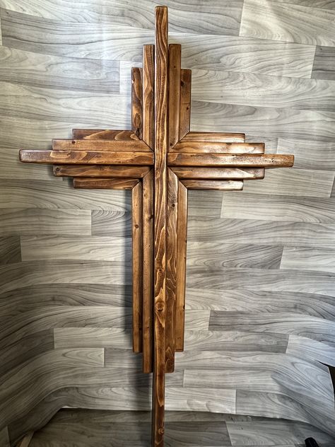 Handcrafted Rustic Layered Cross made from Pine. The cross is 5ft tall by 31in wide and 5in depth.  This would be beautiful displayed in a church, wedding, barn or home.  We are beginning our Etsy shop and take pride in each item made. The cross is one of my favorite items to craft because of its reminder that Jesus died for us.  Shipping time varies depending how it's shipped. We use standard UPS or FedEx due to size.  We appreciate your support and sharing with others. Crosses Diy, Layers Straight, Wood Crosses Diy, Rustic Wood Cross, Cross Wood, Rustic Cross, Wooden Crosses, Cross Crafts, Wood Scraps