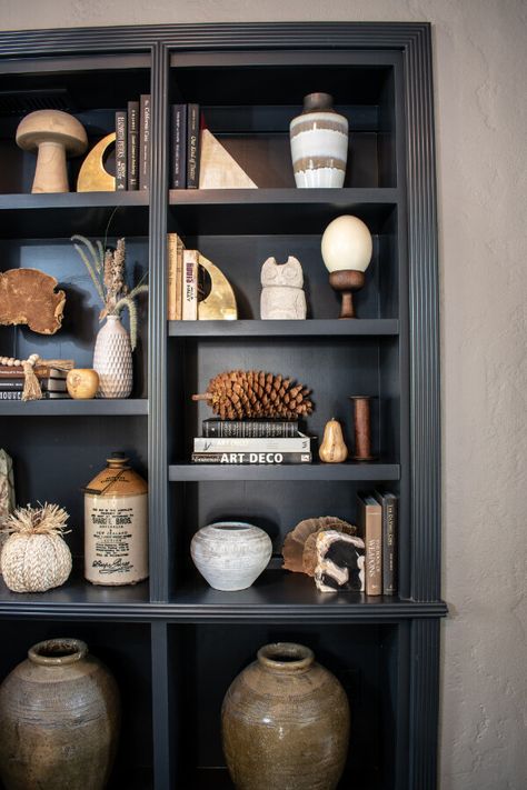 Dark & Moody Living Room Décor [+ Easy Fall Style Ideas] — Greenhouse Studio Dark Grey Bookcase, Styling Dark Wood Bookshelves, Styling Dark Shelves Living Room, Dark Grey Bookshelves, Styling Dark Shelves, Dark Bookcase Styling, Moody Shelves, Moody Bookcase, Black Bookcase Living Room