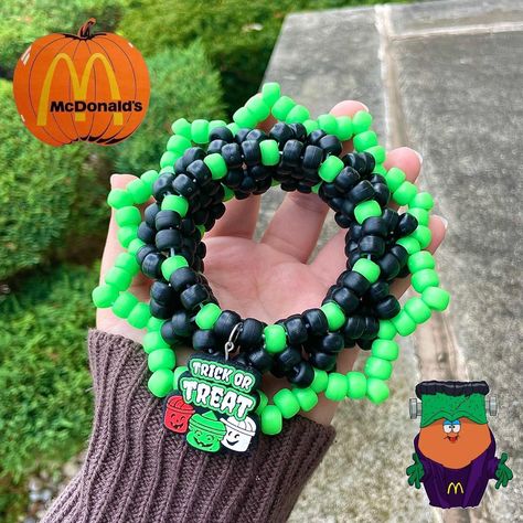 McDonald's Halloween Bucket Kandi Cuff 

- handmade... - Depop Christmas Kandi, Goth Kandi, Kidcore Nostalgia, Fall Goth, Kandi Singles, Kandi Rave, Kawaii Kidcore, Kandi Cuff Patterns, Kandi Cuffs