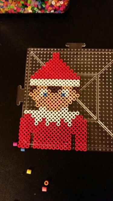 Look what our elf made out of perler beads! I ironed it and made it an ornament,  the kids loved it! Elf Perler Beads, Elf On The Shelf Perler Beads, Perler Christmas, Christmas Diy Kids, Christmas Perler Beads, Easy Perler Bead Patterns, Burlap Christmas Tree, Melty Bead Patterns, Christmas Tree Diy