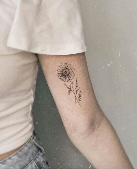 Daisy Tattoo Inner Bicep, Inner Arm Sunflower Tattoo, Sunflower Tattoo Ribcage, Sunflower Tattoo Back Of Arm, Sunflower Forearm Tattoo Women, Sunflower Tattoo Ankle, Sunflower Tattoo Arm, Sunflower Ankle Tattoo, Fineline Sunflower Tattoo