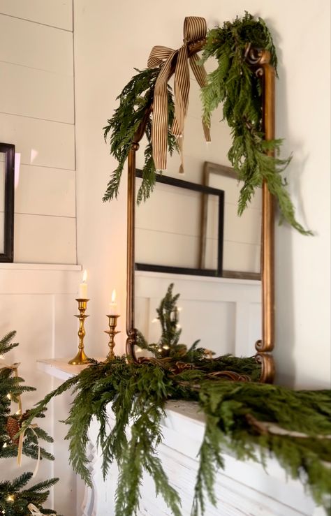 Sconces Christmas Decor, Mantle Decor With Frame Tv, Arched Mirror Christmas Decor, Bow On Mirror Christmas, Layering Christmas Garland, Christmas Mantel Mirror, Classy Christmas Mantle, Christmas Accent Wall, Holiday Mirror Decor