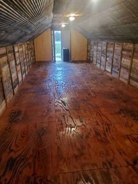 Corrugated steel, burnt plywood floor, barnwood ceiling, pallet wood sides. All total have about 300 bucks in this!! #mancave #dealfinder Pallet Wood Ceiling, Burnt Plywood Floor, Barnwood Ceiling, Plywood Floors, Plywood Ceiling, Hunting Lodge Decor, Pex Plumbing, Corrugated Steel, Plywood Floor