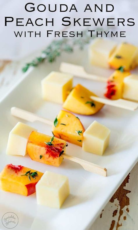 These Gouda and Peach skewers are a take on the 80's party classic cheese & pineapple. Sweet fruit, savory cheese, all in small cubes that make it so easy to eat. These fruit skewers are perfect for a party! And the fresh thyme gives these gouda and peach skewers something a little bit different. Something that will surprise and delight and something your guests will remember! Recipe by Sprinkles and Sprouts | Delicious Food for Easy Entertaining #partyfood #fruitskewers #peaches #fruitkebab Peach Skewers, Nye Appetizers, Food Skewers, Cheese And Fruit, Fruit Kebabs, Savory Cheese, Fruit Skewers, Summer Appetizer, Snacks Für Party