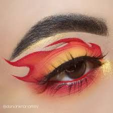 Eye Fantasy Makeup, Fire Hair Styles, Red Flame Eye Makeup, Flame Halloween Makeup, Fireball Makeup Looks, Red Fire Eye Makeup, Simple Fire Makeup, Fire Flame Costume, Flame Eye Makeup Fire