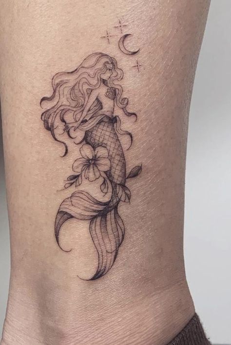 17 Magical Little Mermaid Tattoo Ideas for a Fantastical 2024 - Get Inspired Now! Little Mermaid Tattoo Ideas, Mermaid Tattoo Ideas, Small Mermaid Tattoo, Ocean Wave Tattoo, Ariel Tattoo, Tattoo Dream, Little Mermaid Tattoo, Rib Tattoos For Guys, Wave Tattoo Design