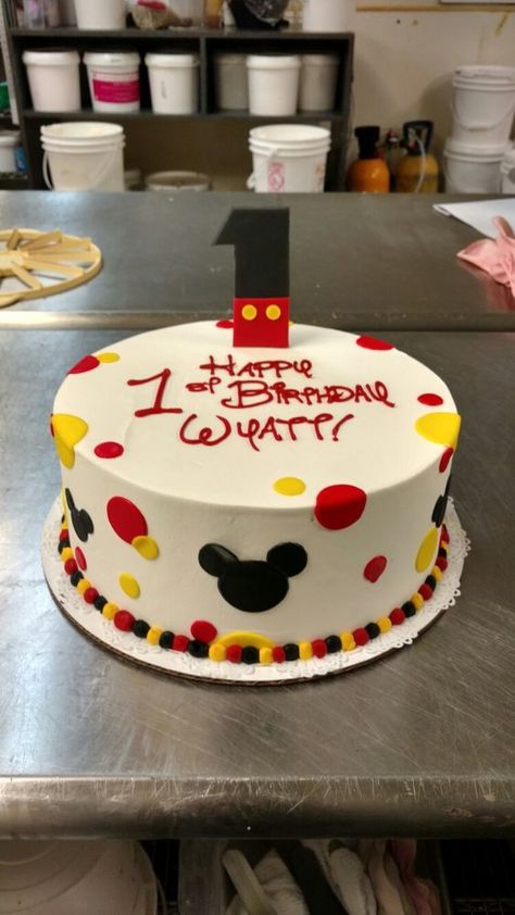 A festive first birthday cake featuring a Mickey Mouse fondant one.: Mickey Mouse Torte, Mickey Mouse Fondant, Mickey Mouse 1st Birthday Cake, Bolo Do Mickey Mouse, Cake Mickey Mouse, Levi Birthday, Cupcakes Minnie Mouse, Mickey Birthday Cakes, Γενέθλια Mickey Mouse