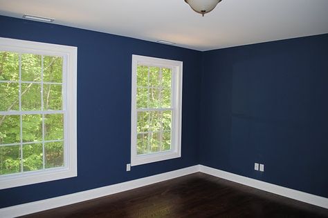 Benjamin Moore's Newburyport Blue (HC-155).  How amazing is this blue? Especially with the white trim? Benjamin Moore Newburyport Blue, Blue Bedroom Ideas For Couples, Newburyport Blue, Apartment Decorating For Couples, Blue Paint Color, Blue Bedroom Walls, Blue Bedroom Decor, Blue Paint Colors, Man Room