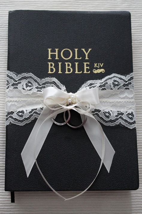 Bible Bearer, Blessing Of Rings Wedding, Wedding Ring On A Book, Bible Ring Bearer, Wedding Rings On Bible, Ring Barrier Pillow, Wrap Wedding Band, Bible Photos, Ring Boy