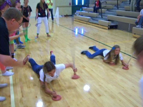 A super easy game for a rally or assembly. You just need a few plungers and have the kids lay on their stomachs and pull themselves across the floor in a race!   {Bishop Manogue High School, Reno} Fun High School Assembly Games, Pepfest Games, Assembly Games Elementary, High School Assembly Games, Fun Pep Rally Games High Schools, High School Assembly Ideas, Rally Games High School, Pep Assembly Games High School, Pep Rally Games High School