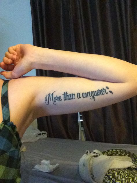 More than a conqueror tattoo. Semicolon movement. Bible verse. Conqueror Tattoo Ideas, More Than Conquerors Tattoo, More Than A Conqueror Tattoo, You Are More Than A Conqueror, More Than Conquerors Scripture, Warrior Tattoo Word Semicolon, Bible Verse Tattoos, Verse Tattoos, Sweet Tattoos