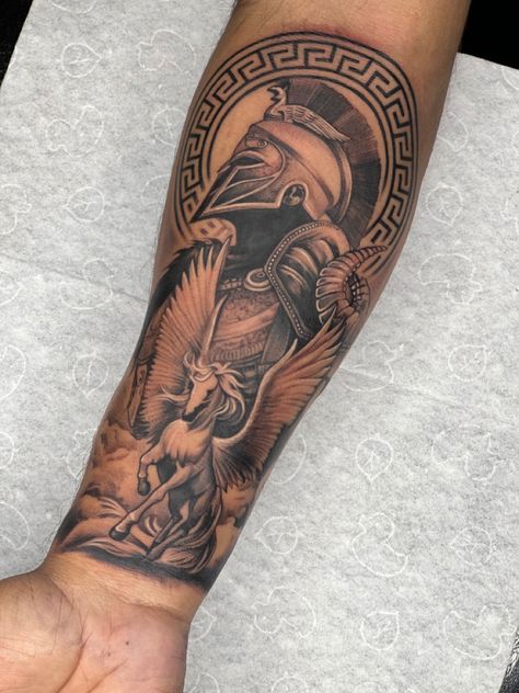 Greek Upper Arm Tattoo, Roman Words Tattoo, Greek God Tattoos For Men Forearm, Masculine Forearm Tattoo, Gladiator Tattoos For Men, Arm Tattoo Men Greek Mythology, Greek Arm Tattoos For Men, Greek Ares Tattoo, Aries Greek God Tattoo