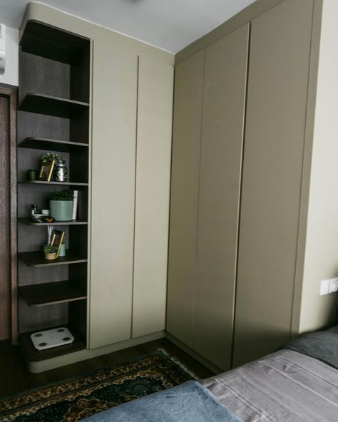 An L-shaped wardrobe can be a smart choice for a HDB BTO master bedroom primarily, for optimising space utilisation: L-shaped wardrobes are designed to maximize corner spaces efficiently, making them ideal for rooms with limited space like HDB bedrooms. By incorporating curved shelves facing the room entrance, we can create a more inviting and harmonious flow in the carpentry design. This also allows us to seamlessly extend the aesthetic of the wood laminate chosen for the living area into t... L Shaped Wardrobe, L Shape Wardrobe, Curved Shelves, Corner Space, Room Entrance, Build A Closet, Optimize Space, Wood Laminate, L Shape