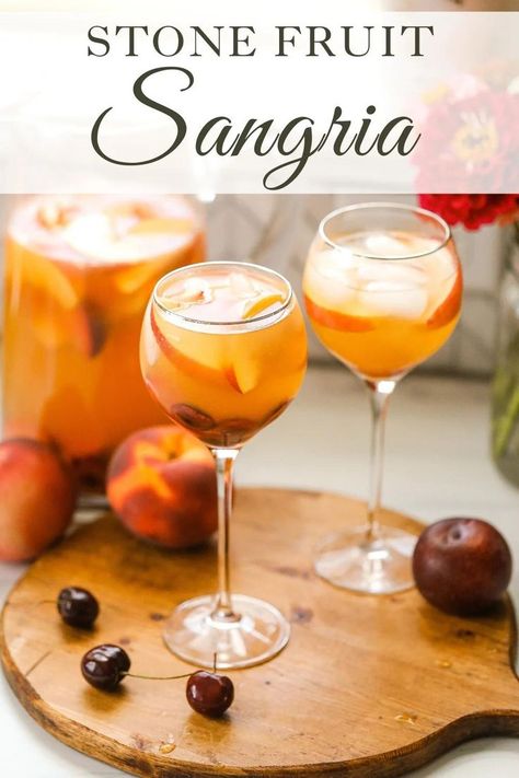 This fruity and refreshing Stone Fruit Sangria is delicious and perfect to make in the late summer and early fall months. It's a sangria recipe that is made with white wine and a variety of stone fruits including peaches, nectarines, cherries and plums. To find this Stone Fruit Sangria recipe visit Sugar Maple Farmhouse. Summer Drink Recipes Nonalcoholic, Stone Fruit Sangria, Peach Sangria Recipes, Drinks Alcohol Recipes Easy, Fall Sangria Recipes, White Wine Sangria Recipe, Fruit Sangria, Hot Winter Drinks, White Wine Sangria