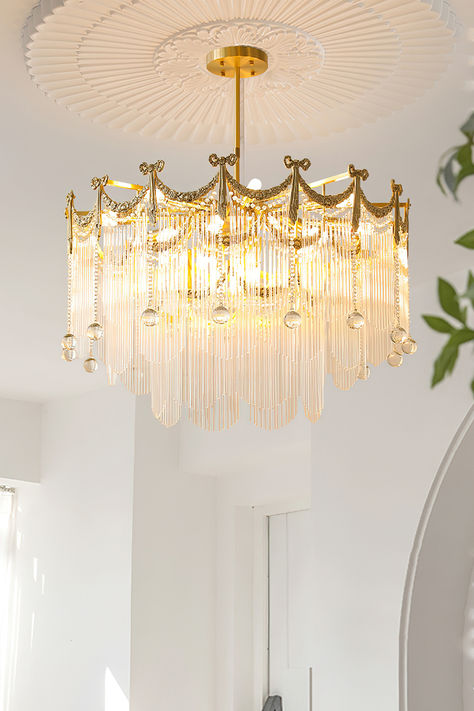 Transform your space with our Palace Water Drop Chandelier. This charming modern chandelier has an old-world beauty that adds a touch of elegance to any room. The crystal chain and round beads create a warm and romantic atmosphere, creating a chic ambiance at the flick of a switch. This chandelier will enhance the style of your home, perfect for the foyer, dining room, living room, and bedroom. Foyer Dining Room, Waterfall Chandelier, Drop Chandelier, Chandelier Bedroom, Romantic Atmosphere, Crystal Chain, Dining Room Living Room, Glass Chandelier, Water Drops