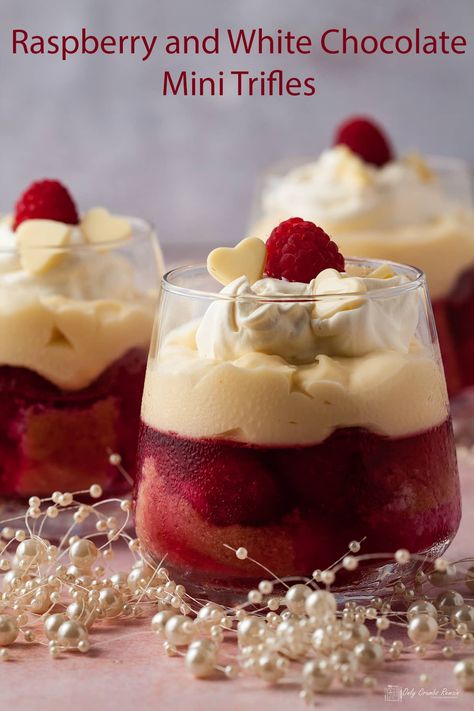 Pretty individual raspberry and white chocolate trifles. Traditional British trifle, given a modern twist. Layers of sponge jelly and fruit topped with a white chocolate custard and whipped cream. #OnlyCrumbsRemain Mini Triffles, British Trifle Recipe, Parfait Desserts Easy, British Trifle, Chocolate Trifles, Mini Trifle Desserts, Individual Christmas Desserts, Easy Dinner Party Desserts, Mini Trifles