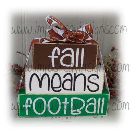 "Fall Means Football Itty Bitty Wood Blocks, Fall Decor, Football Decor, Wood Block Decor, Tier Tray Decor, Autumn Decor Perfect set of blocks for the football fan. It's football season....college, pro, high school. This itty bitty block set is perfect to add to a tier tray display. Blocks are painted Kelly green, white and dark brown. The edges have been sanded to give the blocks a worn distressed look. The lettering is done in white and black permanent vinyl. A coordinating ribbon has been tie Football Home Decor Diy, Football Tree Ideas, Football Pillows Diy, Football Season Decor Diy, Fall Football Decor Ideas For The Home, Football Season Decor, Football Diy Crafts, Fall Football Crafts, Diy Football Decor