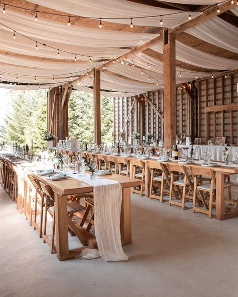 Our Natural Wood Folding Chairs look wonderful in this rustic Bowen Island reception! Photography: @eldunfieldphotography DOC: Stephanie @encoreeventswedding Venue: Red Barn Bowen Island Catering: @the.nomadic.kitchen HMUA: @mua.caitlin DJ: @willsea604 Florals: @ourlittleflowercompany Rentals: @pedersenseventrentals Bridal Gown: @alexandragrecco Bridal Boutique: @thedresstheoryseattle Groom’s Suit: @boss Pole Shed Wedding Receptions, Pole Barn Wedding Reception, Pole Barn Wedding, Shed Wedding, Bowen Island, Reception Photography, Wood Folding Chair, Barn Wedding Reception, Pinterest Wedding