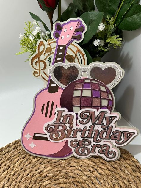 Here’s another custom handmade Taylor Swift Inspired Cake Topper. With a different variety of purples and pink tones and textures. Love how it all blends together and hope they love it on their special day. The link is below for this cake topper. ⭐️https://thebritishcrafthouse.co.uk/shop/hannahs-craft-creation/ ⭐️https://hannahscraftcreatio.etsy.com #handmade #handmadecrafts #handmadeuk #handmadewithlove #ukcraftersmarketplace #ukcraft #ukcrafters #smallbusinessuk #craft #ukmarket #smallb... Taylor Swift Cake Topper, Taylor Swift Inspired Cake, Taylor Swift Cake, Crafting Business, Taylor Swift Inspired, Small Business Uk, Craft Business, Pink Tone, Paper Crafting