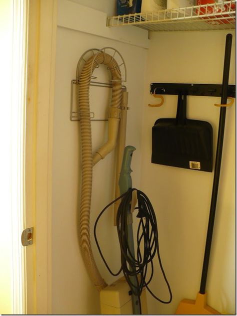 vacuum hose holder-organizing utility closets Vacuum Cleaner Hose Storage, Rainbow Vacuum Storage Ideas, Central Vacuum Hose Storage Ideas, Vacuum Storage Ideas, Rainbow Vacuum Cleaner, Linen Closet Makeover, Vacuum Cleaner Storage, Cleaning Closet Organization, Rainbow Vacuum