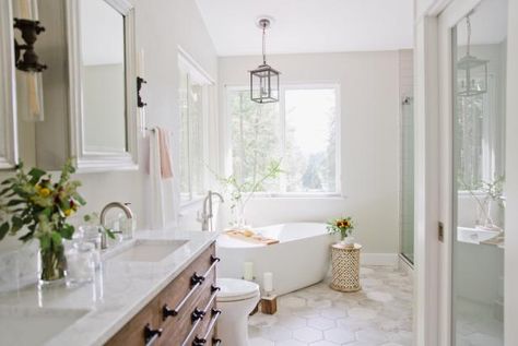 This bathroom breaks up its boxy shape by angling the freestanding tub across a corner. Check out the smart idea at HGTV.com. Corner Freestanding Bathtub, Corner Soaking Tub, Clawfoot Tub Bathroom, Bathroom Freestanding, Corner Bath, Corner Tub, Bathroom Images, Master Bath Remodel, Freestanding Tub