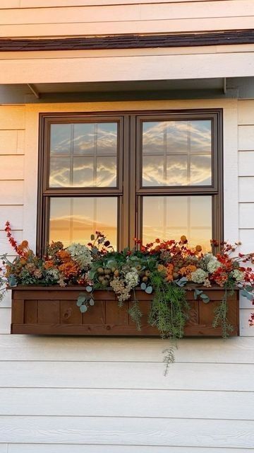 Outside Window Flower Boxes, Fake Plant Window Boxes, Fall Windows Boxes, Flower Boxes Outside Windows, Artificial Flower Window Boxes, Fake Window Flower Boxes, Front Of House Window Boxes, Planter Box On House, Window Box With Fake Flowers