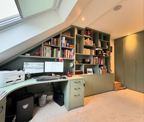 Creating a delightful work-from-home experience. Our latest custom-built home office, featuring a corner desk, cabinets, and a uniquely arranged bookcase with shelves, all painted in #farrowandballpaint Card Room Green. Desk Cabinets, Card Room Green, Card Room, Curved Desk, Slanted Ceiling, Room Green, Farrow And Ball Paint, Custom Built Homes, Built In Desk