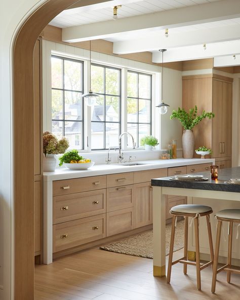 Be captivated by the timeless allure of this classic kitchen in Greenwich, where rustic charm meets refined elegance. Featuring a sophisticated blend of Shaker and Slab cabinetry in Rift-Cut White Oak, custom stained in Farrow & Ball’s Pigeon, this space radiates warmth and character. The island, painted in Farrow & Ball’s School House White and adorned with striking gold-capped feet, creates a harmonious balance of style and comfort. A perfect embodiment of a cozy cottage dream. ✨🏡 #KitchenG... Cabinets With Copper Hardware, School House White, White Oak Cabinets, Copper Hardware, House White, Classic Kitchen, Shaker Kitchen, Classic Kitchens, School House