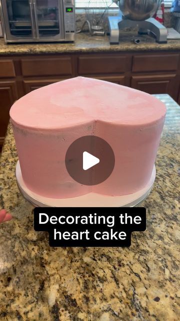 Ramona Elena Chronis on Instagram: "Here’s the decorating part of the heart cake I previously posted. . . . . . . . #bake #baking #cake #bakery #baker #cakes #yummy #bakersofinstagram #delicious #sweet #cakedecorating #cakesofinstagram #love #cakestagram #homebaker #instagood #desserts #instacake #cakedesign #sweets #birthday #tasty #bakinglove #instagram #cakeart #buttercream #homebaking #yum #cakelover #bakedgoods" Heart Cake Buttercream, How To Decorate A Heart Shaped Cake, 2 Tier Heart Shaped Cake, Making A Heart Shaped Cake, Trendy Heart Cake, Heart Baby Shower Cake, Heart Cake Decorating Ideas, White And Pink Heart Cake, Lambeth Heart Cake