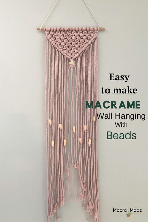 Learn how to make a simple macrame wall hanging with beads. Make this using only half hitch and square knots for a boho piece that will look good anywhere. Knitted Wall Hanging Ideas, Gothic Macrame Wall Hangings, Square Knot Macrame Wall Hangings, How To Hang Macrame On Wall, Macrame Simple Wall Hanging, Simple Macrame Patterns, Beaded Macrame Wall Hanging, Macrame With Beads Wall Hangings, How To Make Macrame Wall Hangings