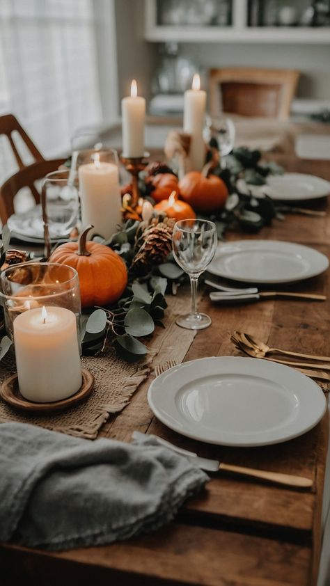 Create a stunning fall table setting this season with our autumn-inspired rustic and elegant wedding table decoration ideas Whether you're planning an intimate gathering or an extravagant event our round table decor featuring dollar tree autumn dinner elements will transform your dining room into a beautiful and casual setting Spark creativity and set the mood for a warm and inviting autumn dining experience Fall Potluck Table Decorations, Aesthetic Thanksgiving Table Decor, Simple Table Scape, Large Thanksgiving Dinner Table, Round Table Fall Decor, Set A Table For Dinner, Table Setting Ideas Casual, Simple Fall Table Decor, Thanksgiving Dinner Table Decor