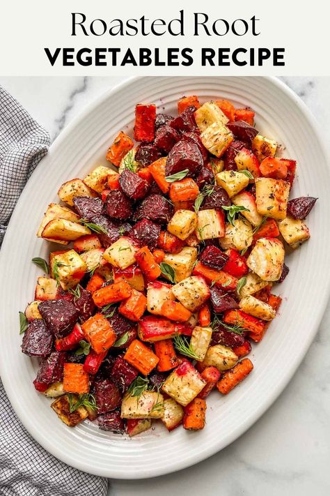 Oven roasted root vegetables on a large serving platter. Oven Roasted Root Vegetables, Roasted Fall Vegetables, Root Vegetables Recipes, Roasted Veggies In Oven, Colorful Carrots, Roasted Root Veggies, Thanksgiving Vegetables, Roasted Vegetable Recipes, Roasted Root Vegetables