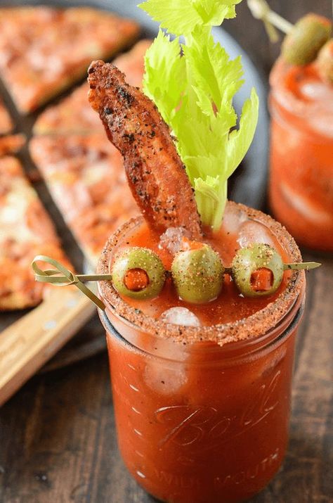 This easy bloody mary recipe tastes delicious and is great for a brunch get together. Pair it with some pizza and you'll want to host brunch every day! #recipesforbloodymary #recipesforbloodymarymix #spicybloodymaryrecipe #spicybloodmary #bloodymary #drinkrecipe #cocktailrecipe #bloodymarycocktail #baconbloodymary #bloodymarywithbacon Spicy Bacon, Perfect Brunch, Brunch Cocktails, Classic Cocktail, Daiquiri, Alcohol Recipes, Simple Recipe, Bellini, Sangria