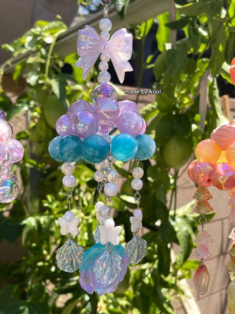 Spin able / about 20cm long and 7cm wide / made of 16mm arcrylic beads #beads #handmade #windchimes #rose #beading #beadwork #homedecorideas Beads Wind Chimes, Handmade Windchimes, Windchimes Diy, Misty Dawn, Magical Items, Mirror Pendant, Bead Bag, Phone Straps, Hanging Beads