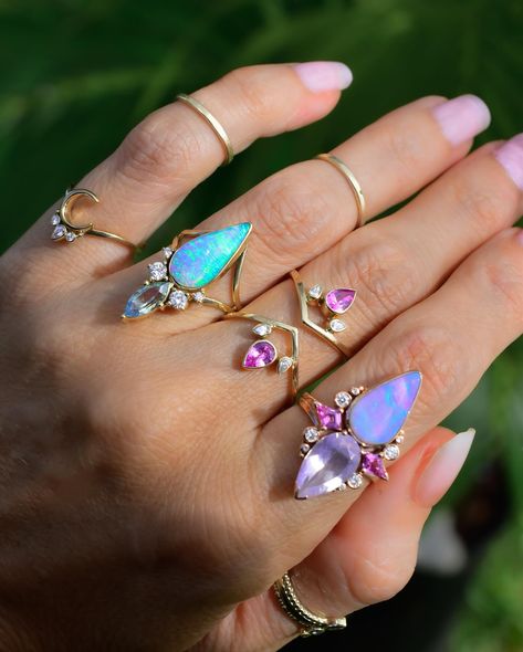 Some of my favorite Opal and natural gemstone OOAK Talisman rings available for a steal right now for my annual Black Friday Sale! DM me for the code! Right to left, 1. Lavender Australian Opal with Lavender Quartz and Diamonds, Anahera Ring in Solid 14k Rose Gold with kite shaped Fuchsia Sapphires. Using Kite shaped gems between the two stones, evolving angelic or fairy Symbolism. This new spin in aptly Named the Anahera Ring, meaning angel in Māori. It has such a bohemian vibe to me. Ma... Ring Meaning, Stone Ring Design, Two Stone Ring, Lavender Opal, Neon Pastel, Pastel Lavender, Lavender Quartz, Australian Opal, Gemstone Healing