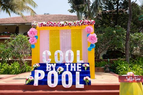 Photo of Giant pool party decor idea Pool Party Entry Ideas, Haldi Pool Party, Pool Party Photo Booth, Haldi Decoration Near Swimming Pool, Pool Side Mehendi Decor, Poolside Mehndi Decor, Haldi Decoration Near Pool Side, Poolside Sangeet Decor, Wedding Pool Party Decorations