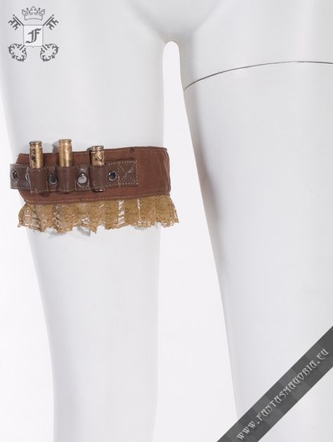 Steampunk bullet garter belt Garter is a narrow band of fabric fastened about the leg (on a thigh or below the knee) This Steampunk garter has a Steampunk Garter, Thigh Accessories, Thigh Band, Thigh Garter, Steampunk Gadgets, Steampunk Couture, Gothic Elegance, Leg Garter, Garter Belts