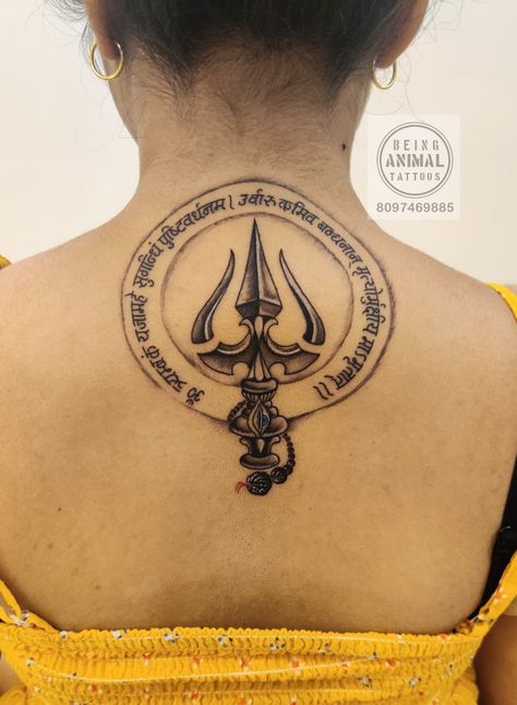 Trishul tattoo design on a back of a girl with mahamrityunjay mantra by being animal tattoos Jogeshwari book your appointment 8097469885. Mahamrityunjay Mantra Tattoo, Trishul Tattoo Design, Aum Tattoo, Mahamrityunjay Mantra, Hindu Tattoos, Trishul Tattoo Designs, Trishul Tattoo, Mantra Tattoo, Shiva Tattoo Design