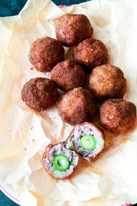 Crispy olive stuffed fried sausage meatballs. Planning a party or gathering? These are perfect little appetizers that not only pack a flavor punch, more so they are so easy to eat and who can resist a meatball, especially one stuffed with Italian olives and cheese? A must try for sure! Breaded Meatballs, Fried Meat, Planning A Party, Stuffed Meatballs, Fried Sausage, Sausage Meatballs, Italian Breadcrumbs, Italian Olives, Snack Dip