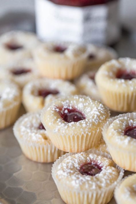 These Mini Raspberry Almond Tarts are the perfect sweet buttery little bites! Great for brunches or baby showers because they can be made ahead. Mini Raspberry Almond Tart, Mini Tea Desserts, Party Mini Dessert Ideas, Raspberry Almond Desserts, Cookie Tables At Weddings Receptions, Snacks For Company Appetizers, Mini Raspberry Desserts, Raspberry Almond Tart Recipe, Tea Party Strawberries