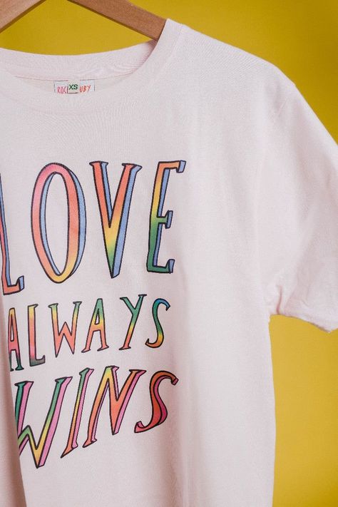 Be Bold and Proud with our LGBTQ Pride Tee. Celebrate your identity and embrace your pride. #BoldAndProud #LGBTPride #LoveIsLoveFashion Varsity Sweatshirt, Lgbt T Shirts, Love Always Wins, Rainbow T Shirt, Pride Tees, Slogan Tshirt, Love And Pride, Slogan Tee, Pride Tshirts