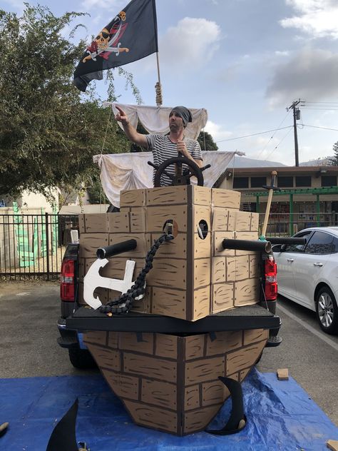 Pirate Car Decorations, Pirate Themed Parade Float, The Goonies Trunk Or Treat, Pirates Of The Caribbean Float Ideas, Pirate Truck Or Treat, Halloween Shipwreck Diy, Pirate Ship Trunk Or Treat Truck, Pirate Ship Parade Float Ideas, Pirate Floats For Parade